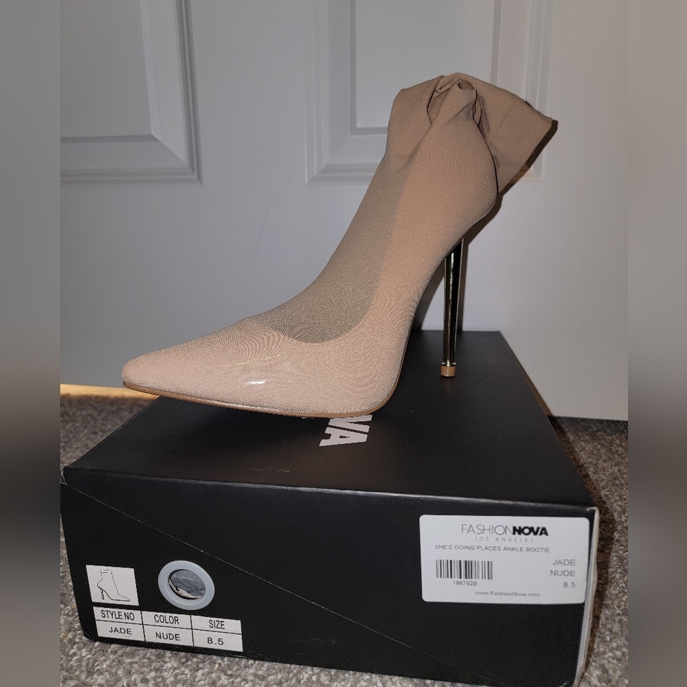 Nude sock heels with gold heel